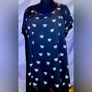 Cheetah print Torrid below hip lightly fitted tunic top black with white print.
